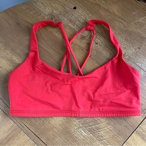 Red Small Lululemon sports bra with cross strap backing